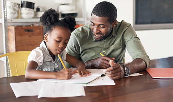 dad-helping-daughter-study